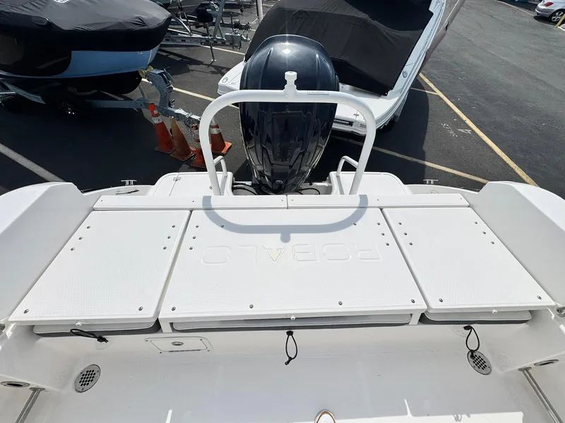 Slide: The Image of 2022 Robalo R230 Center Console boat with outboard motor, viewed from above. - 17