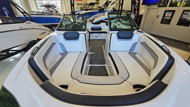 Slide: The Image of 2017 Yamaha Boats AR195 interior with spacious seating and modern design. - 16