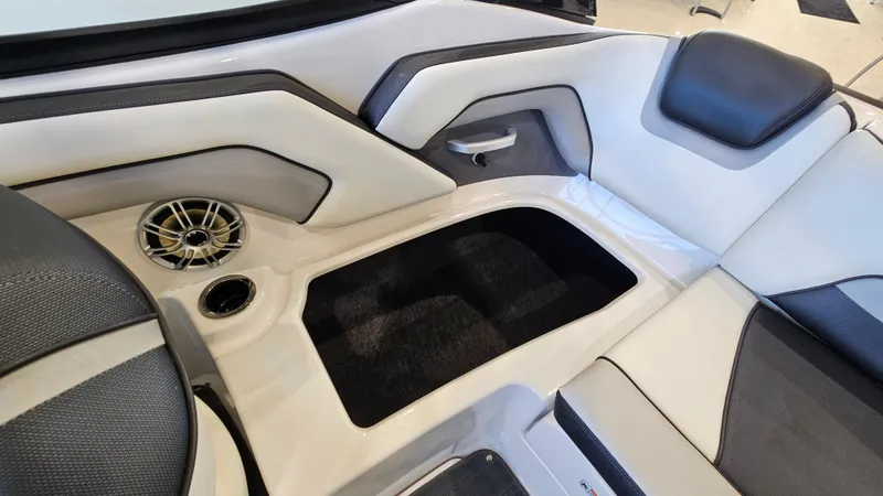 Slide: The Image of 2017 Yamaha AR195 boat interior with speaker and storage compartment. - 20