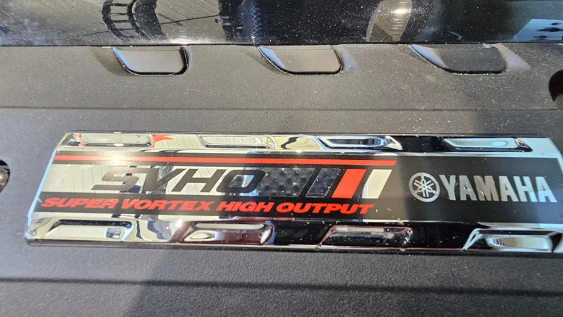 Slide: The Image of 2017 Yamaha AR195 SVHO engine badge, "Super Vortex High Output," on black surface. - 23