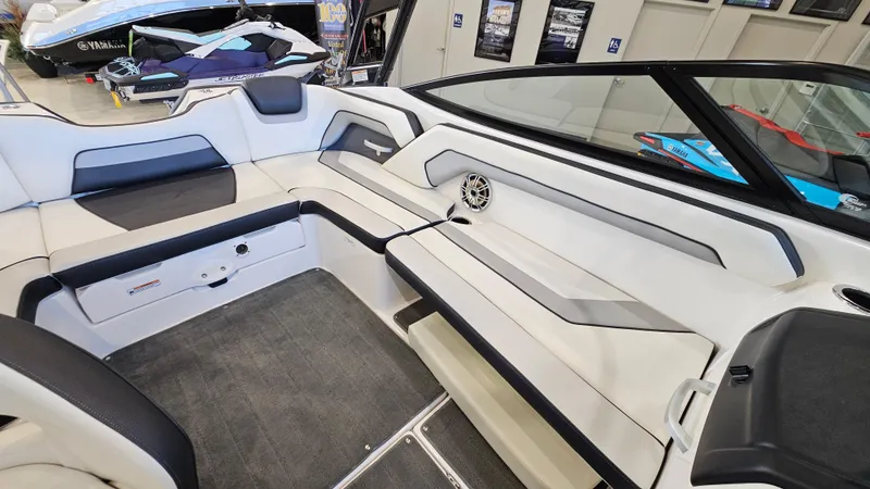 Slide: The Image of 2017 Yamaha Boats AR195 interior with sleek seating and modern design. - 8