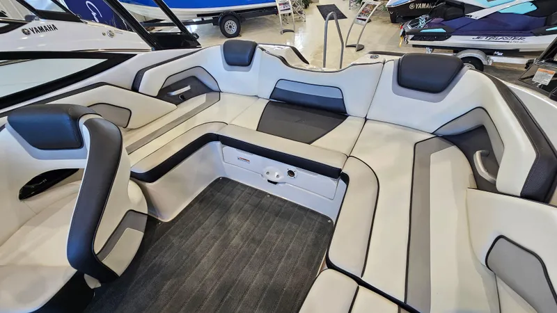 Slide: The Image of 2017 Yamaha AR195 boat interior with sleek, modern seating and stylish design. - 9