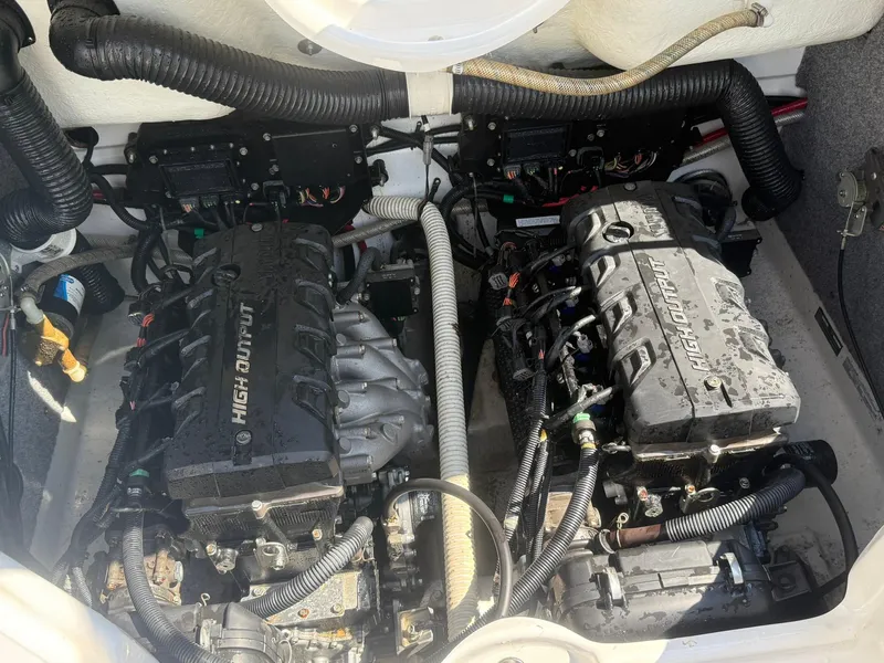 Slide: The Image of Engine compartment of a 2016 Yamaha Boats 212X, featuring dual high-output engines. - 11