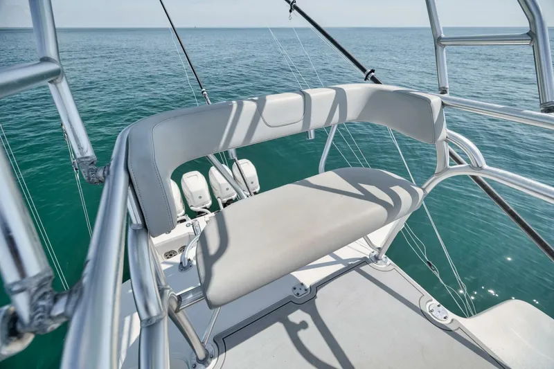 Slide: The Image of 2020 SeaVee 39 boat with elevated seating, overlooking calm ocean waters. - 46