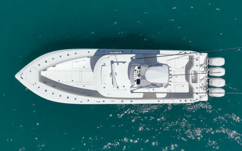 Slide: The Image of Aerial view of 2020 SeaVee 39 boat on clear blue water. - 9