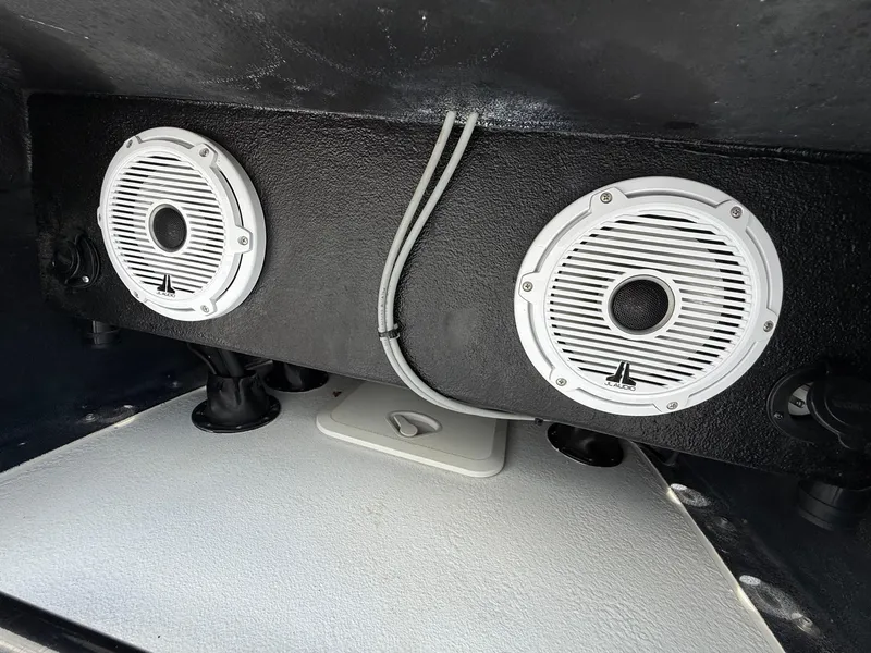 Slide: The Image of 2015 SCB Recon boat speakers, JL Audio, mounted on black panel. - 18