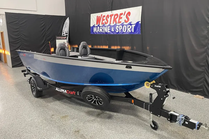 The Image of 2026 Alumacraft Competitor 175X Tiller boat on trailer at Westre's Marine & Sport. - 0