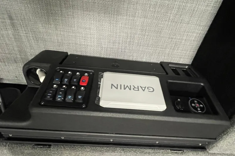 Slide: The Image of Control panel of 2026 Alumacraft Competitor 175X Tiller with Garmin device. - 13