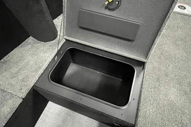 Slide: The Image of Open storage compartment in 2026 Alumacraft Competitor 175X Tiller boat. - 9