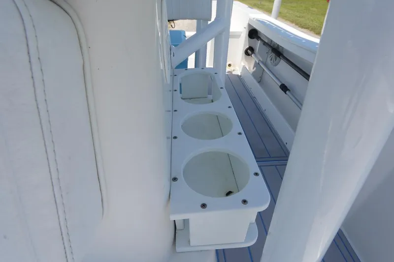 Slide: The Image of Cup holders on a 2003 Key Largo 186 CC boat interior. - 19