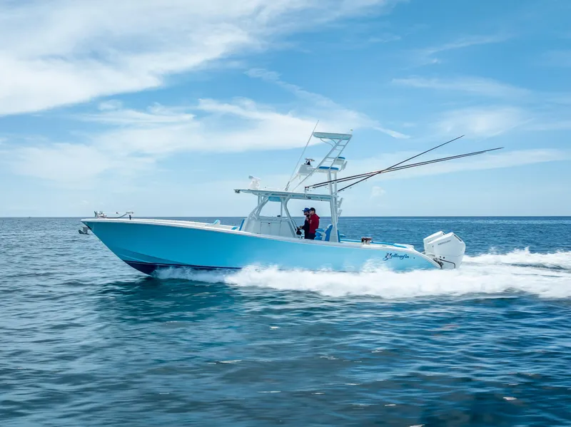 The Image of 2016 Yellowfin 39 Offshore boat cruising on open water under a clear blue sky. - 0