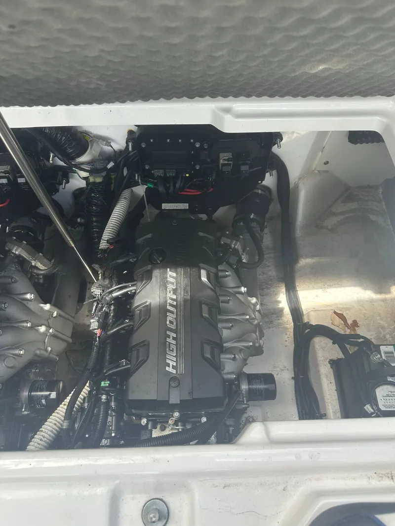 Slide: The Image of 2021 Yamaha Boats 252S engine compartment showcasing high output engine components. - 10