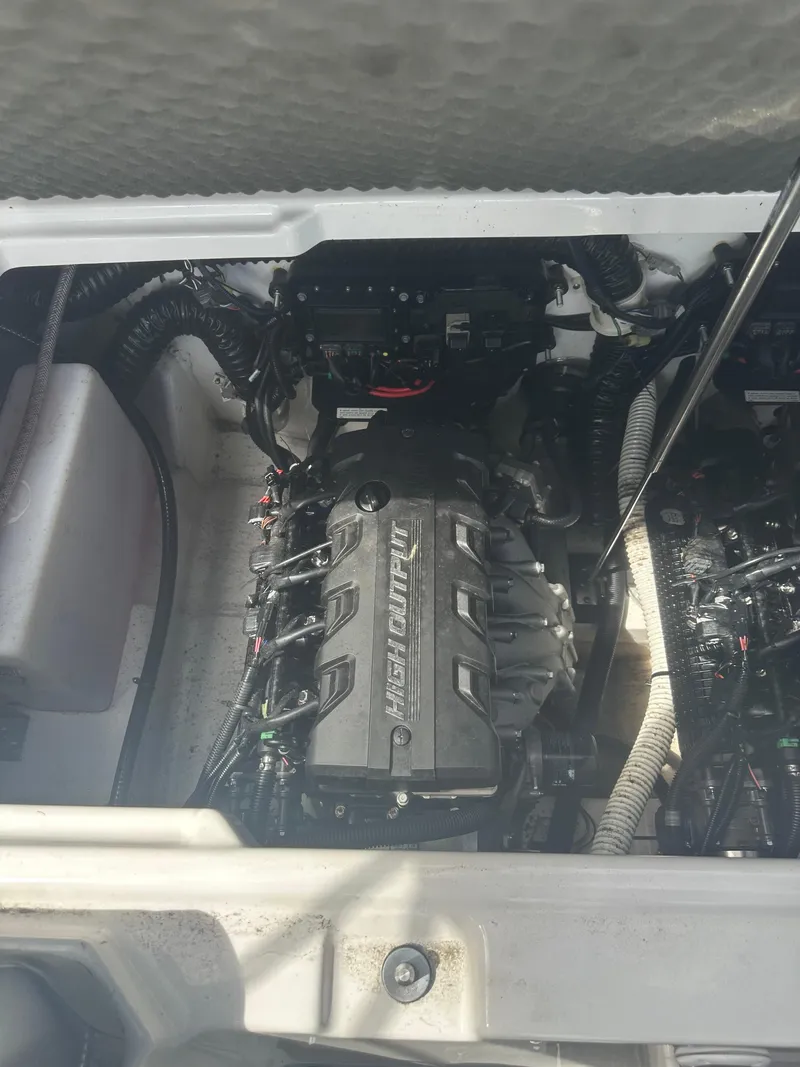 Slide: The Image of 2021 Yamaha Boats 252S engine compartment, showcasing a high-output engine. - 12