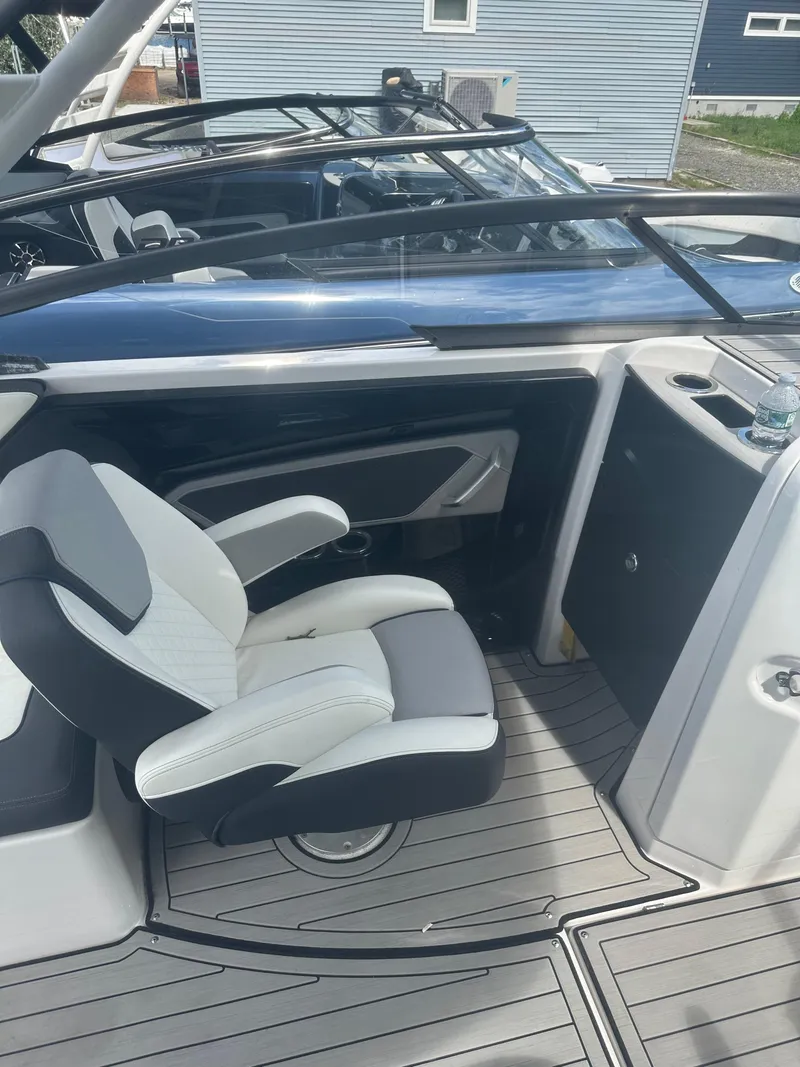 Slide: The Image of 2021 Yamaha Boats 252S interior with sleek seating and modern design. - 16