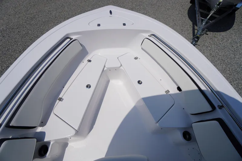 Slide: The Image of 2026 Tidewater 198 CC Adventure boat interior with seating and storage compartments. - 11