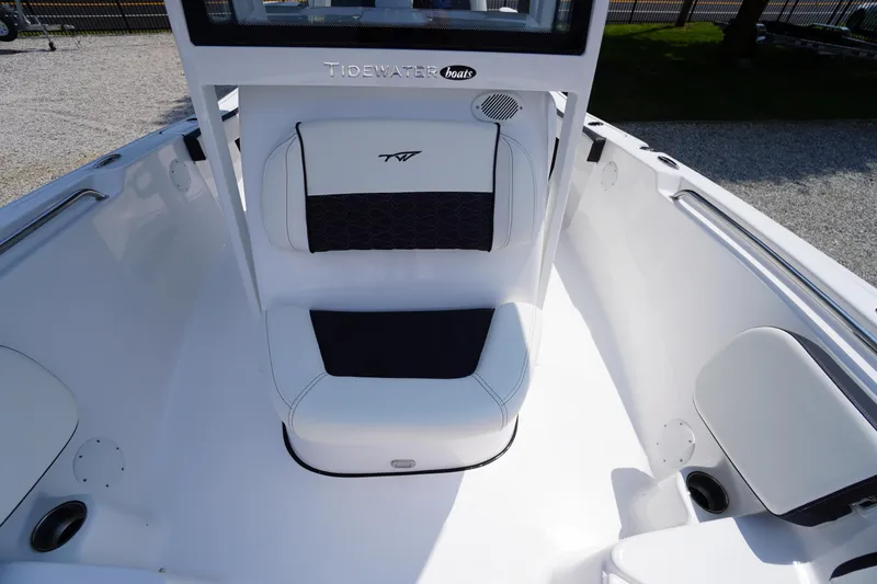 Slide: The Image of 2026 Tidewater 198 CC Adventure boat interior with cushioned seating and sleek design. - 15
