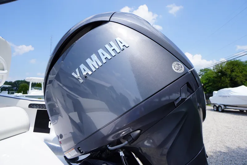 Slide: The Image of 2026 Tidewater 198 CC Adventure with Yamaha outboard motor, sunny day background. - 46