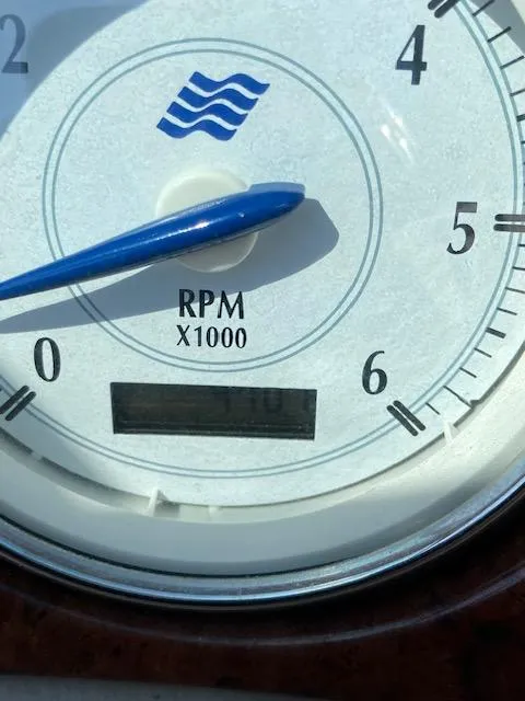 Slide: The Image of Tachometer of 2006 Four Winns 244 Funship showing RPM reading. - 14