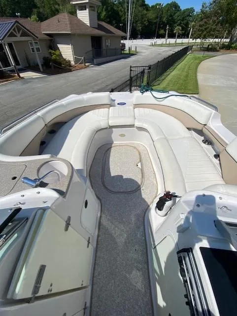 Slide: The Image of 2006 Four Winns 244 Funship boat interior with spacious seating and clean design. - 9