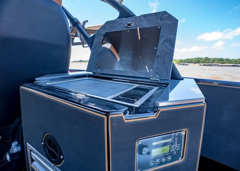 Slide: The Image of Outdoor kitchen setup on a Paradigm 236 boat, 2025 model, featuring a Mastervolt control panel. - 14
