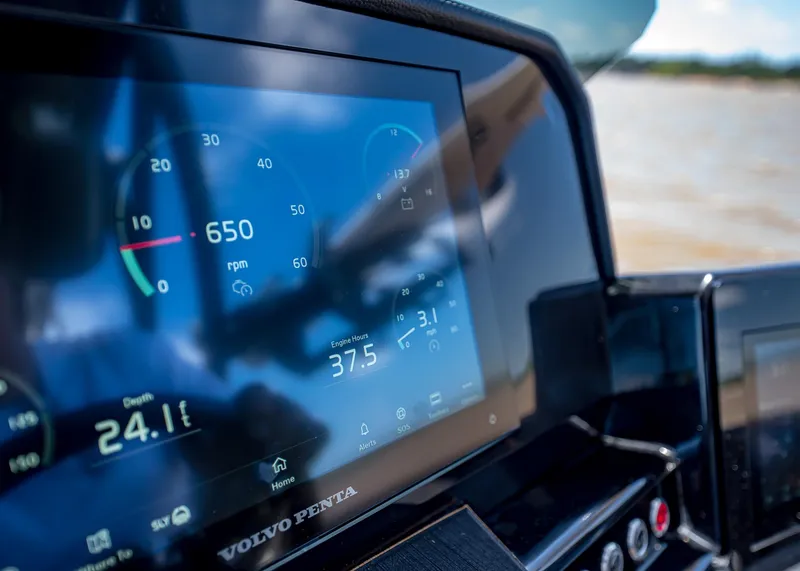 Slide: The Image of Digital dashboard display on a Paradigm 236, 2025 model, showing engine metrics. - 36