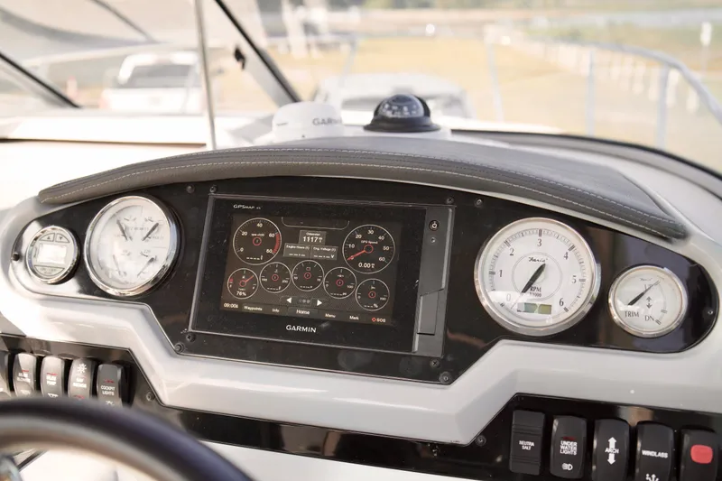 Slide: The Image of Dashboard of a 2019 Regal 26 Express boat with Garmin navigation system. - 20