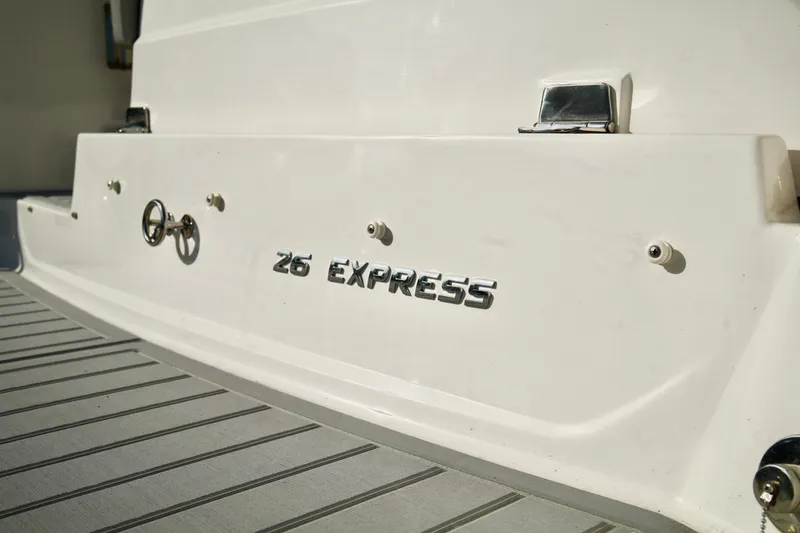 Slide: The Image of 2019 Regal 26 Express boat stern with logo and fittings. - 45