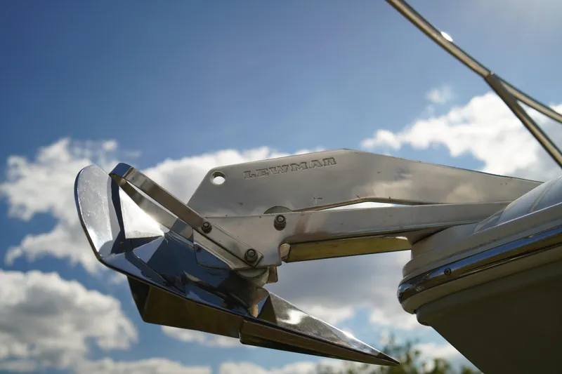 Slide: The Image of Close-up of Lewmar anchor on 2019 Regal 26 Express boat under blue sky. - 6