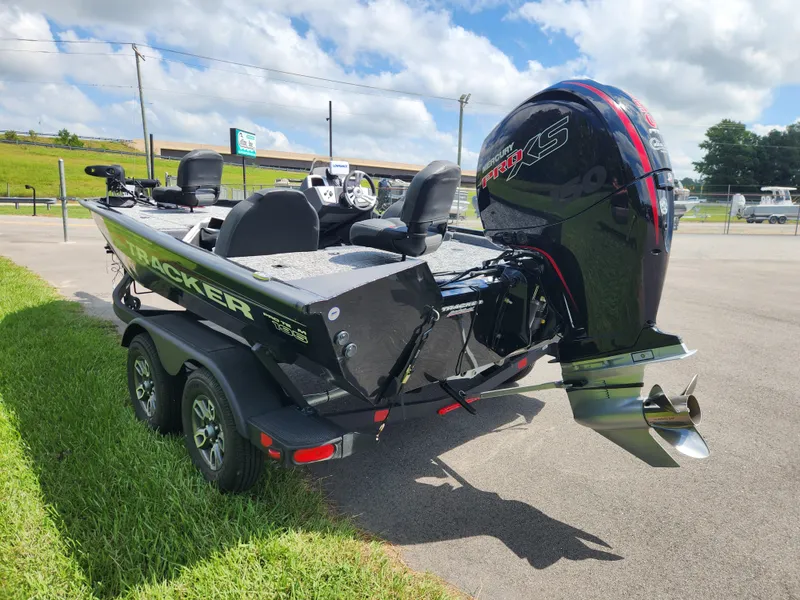 Slide: The Image of 2025 Tracker Pro Team 195 Tournament Edition boat with Mercury Pro XS engine on trailer. - 4
