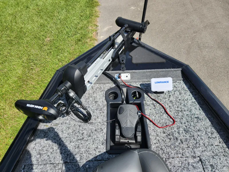Slide: The Image of 2025 Tracker Pro Team 195 Tournament Edition boat with Minn Kota trolling motor and Lowrance electronics. - 9