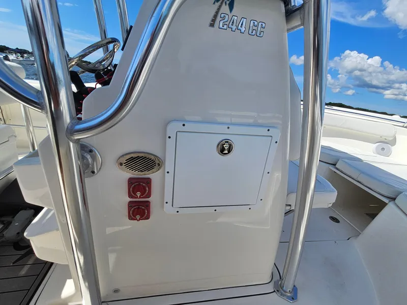 Slide: The Image of 2024 Key West 244 Center Console boat interior with control panel and seating. - 16