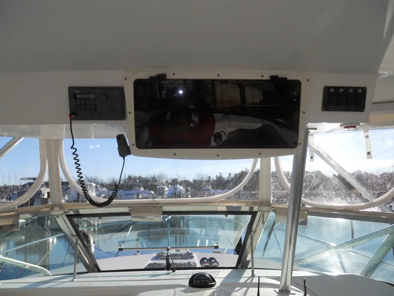 Slide: The Image of Interior view of 2000 Boston Whaler 34 Defiance boat cockpit with navigation equipment. - 16