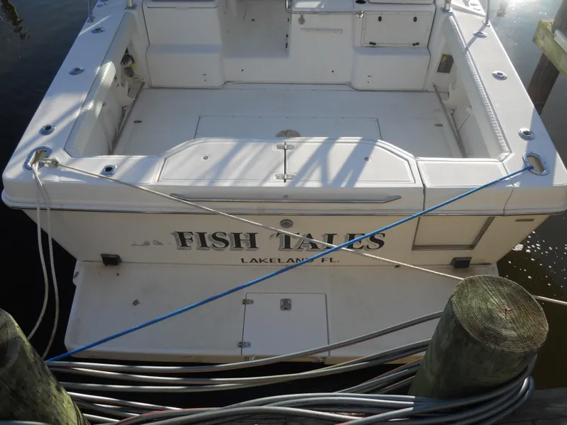 Slide: The Image of Boston Whaler 34 Defiance 2000 boat named "Fish Tales" docked in Lakeland, FL. - 6