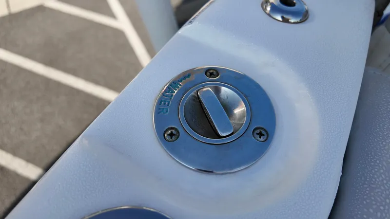 Slide: The Image of Close-up of a 2023 Sea Fox 268 Commander boat's water fill cap. - 12