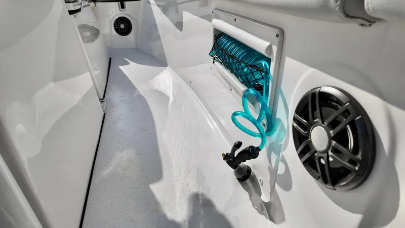 Slide: The Image of 2023 Sea Fox 268 Commander interior with coiled hose and speaker system. - 14