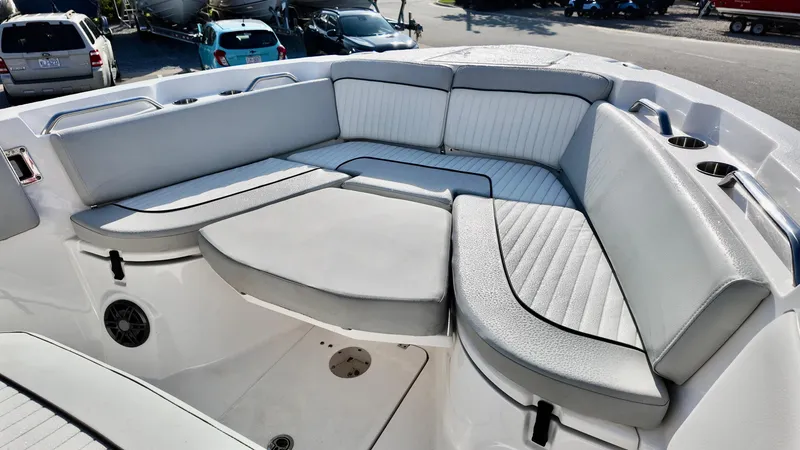 Slide: The Image of 2023 Sea Fox 268 Commander boat interior with cushioned seating and cup holders. - 16