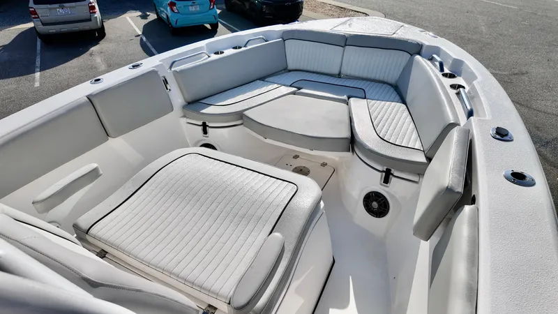 Slide: The Image of 2023 Sea Fox 268 Commander boat interior with cushioned seating and storage compartments. - 17