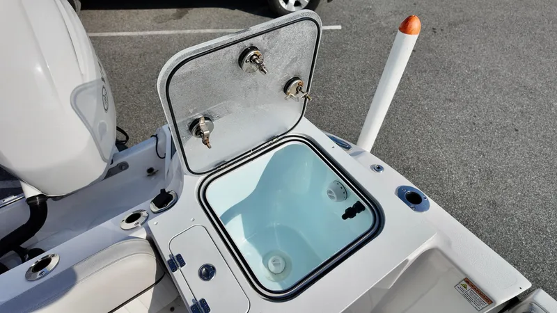 Slide: The Image of Open livewell on 2023 Sea Fox 268 Commander boat, showcasing interior features. - 19