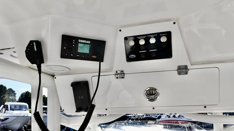 Slide: The Image of 2023 Sea Fox 268 Commander dashboard with Simrad electronics and control panel. - 20