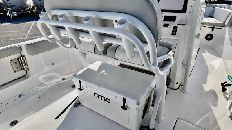 Slide: The Image of 2023 Sea Fox 268 Commander boat interior with seating and RTIC cooler. - 22