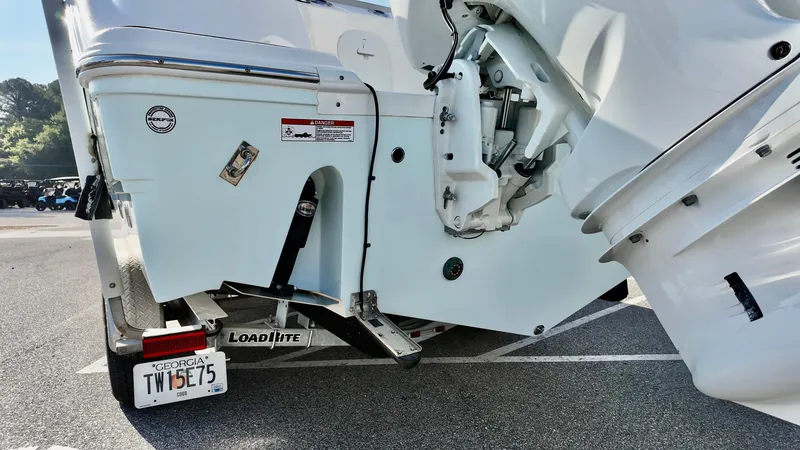 Slide: The Image of 2023 Sea Fox 268 Commander boat on trailer, Georgia license plate visible. - 3