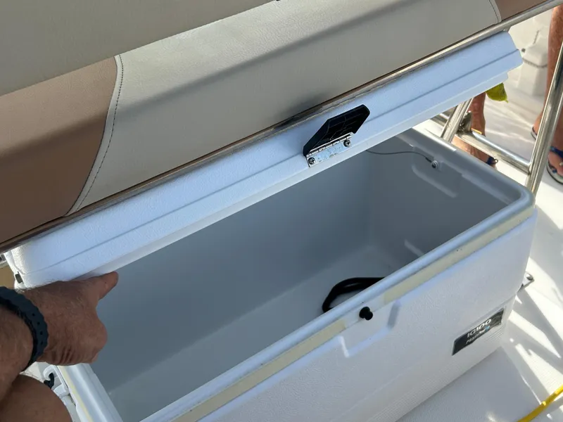 Slide: The Image of Control panel of 2023 NauticStar 231 Hybrid boat with Yamaha throttle and switches. - 12