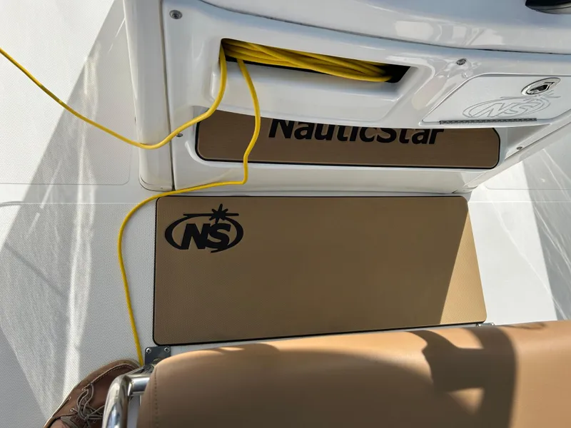 Slide: The Image of VHF radio installed in 2023 NauticStar 231 Hybrid boat compartment. - 19