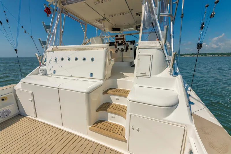 Slide: The Image of 1999 Ocean Yachts 48 Express boat deck with seating and ocean view. - 20