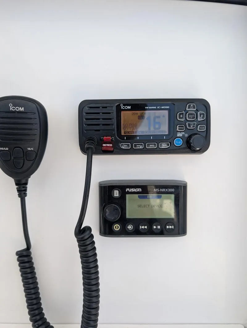 Slide: The Image of Icom marine radio and Fusion audio system on 2016 Southport 272TE boat. - 5