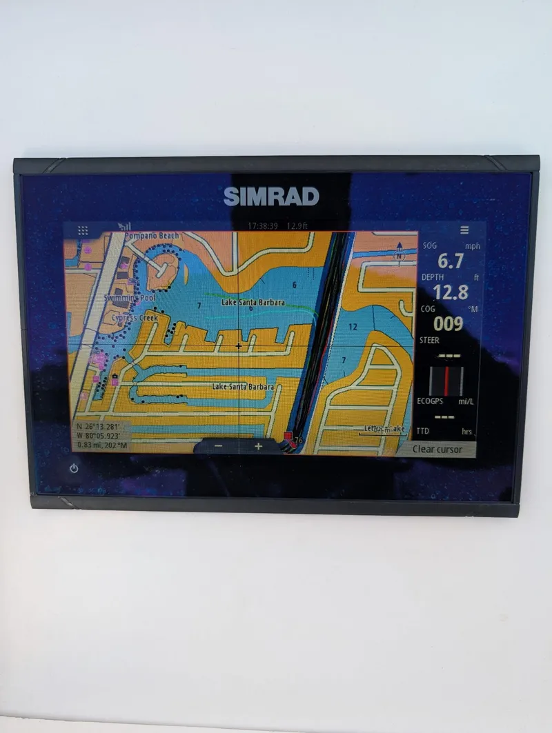 Slide: The Image of Simrad GPS display on 2016 Southport 272TE boat showing navigation map and data. - 6