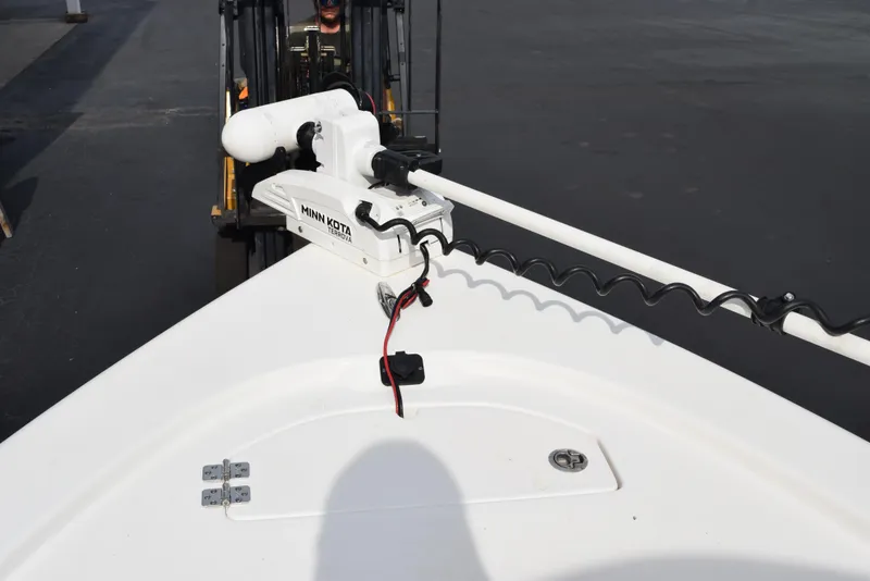Slide: The Image of 2022 Sea Pro 228 Bay boat with Minn Kota trolling motor on deck. - 23