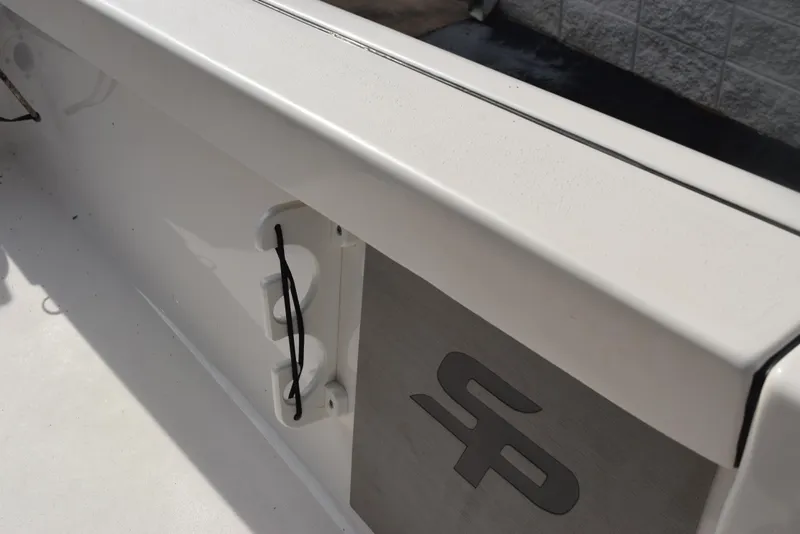 Slide: The Image of 2022 Sea Pro 228 Bay boat detail with SP logo and white finish. - 24