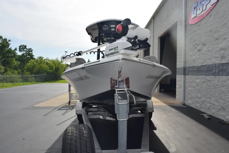 Slide: The Image of 2022 Sea Pro 228 Bay boat on trailer outside a building. - 3