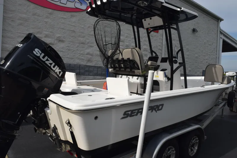 Slide: The Image of 2022 Sea Pro 228 Bay boat with Suzuki engine on trailer. - 4